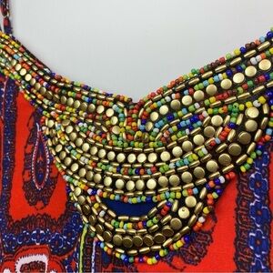 Lord & Taylor • handkerchief hem dress with beaded bib